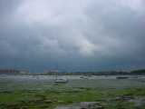 The creek across to Port Solent at low tide on a very stormy day