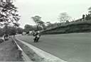 Colin Armett at Mallory in his usual position on his 225cc special...miles in the lead.  What did that bike have that was so special???